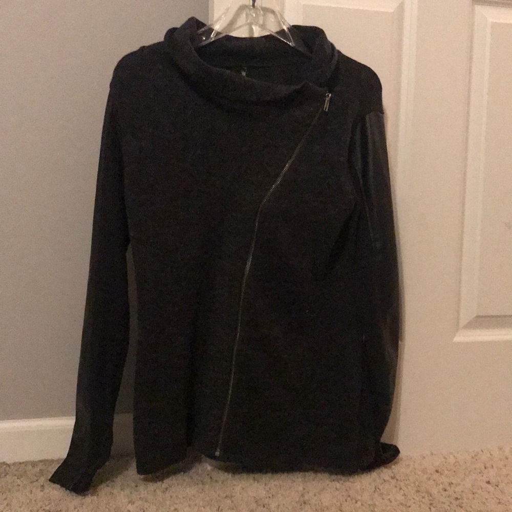 Maurice’s sweater with leather detail